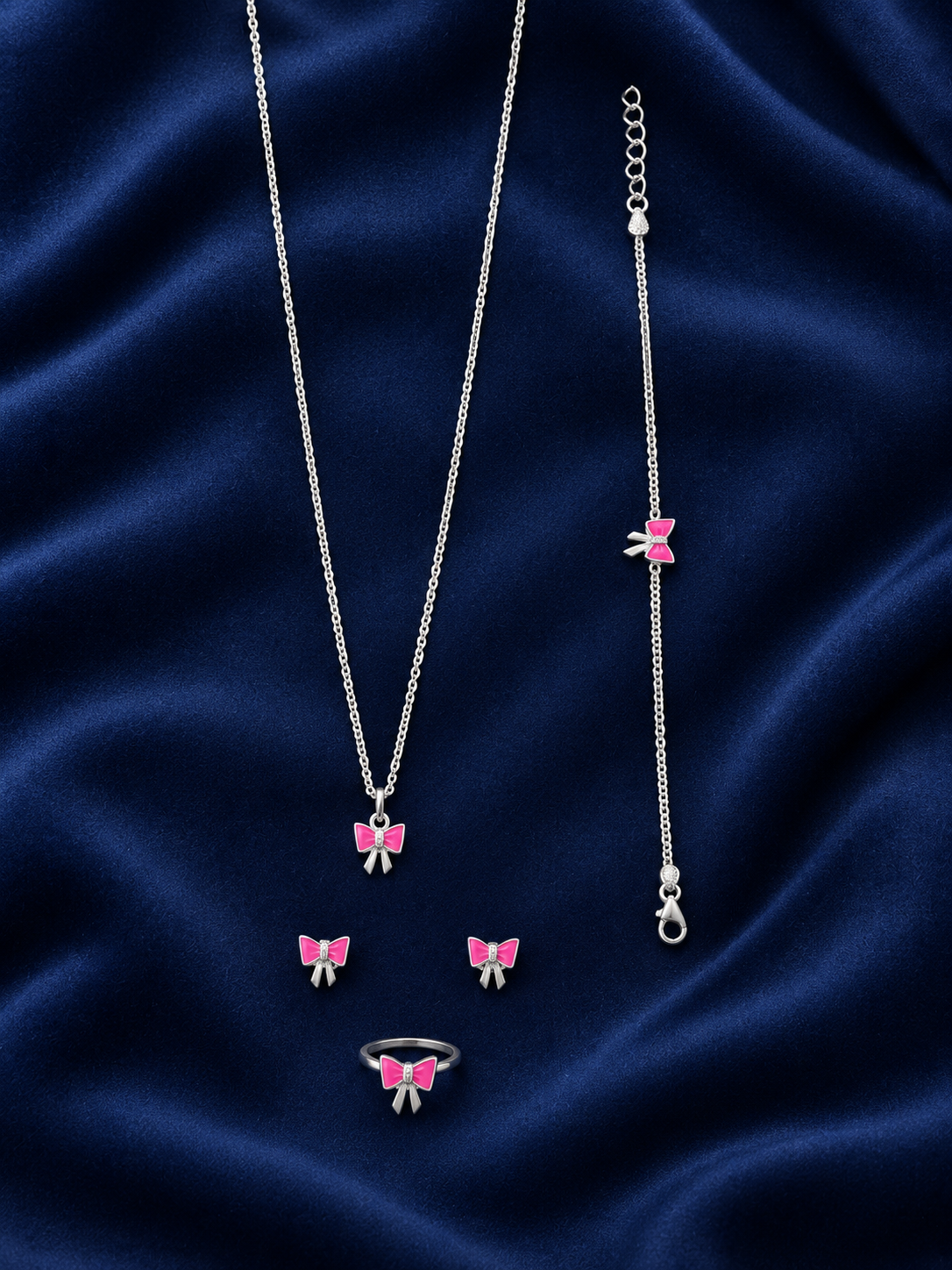925 Sterling Silver Kids' Pink Bow Charm Jewellery Set - Navy Blue Background