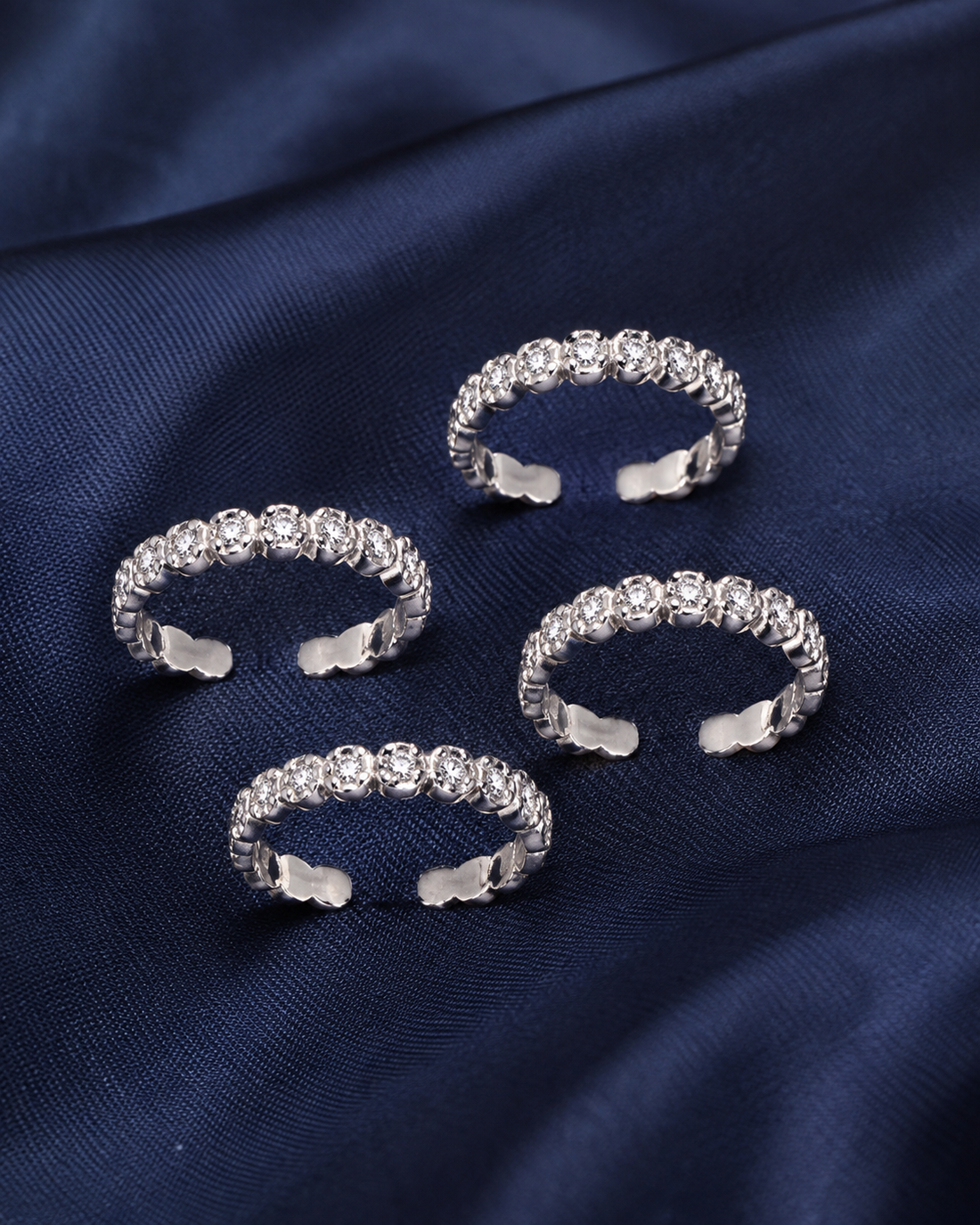 925 Sterling Silver Women's Braided Texture Band Toe Rings - Set of 4 - Navy Blue Background