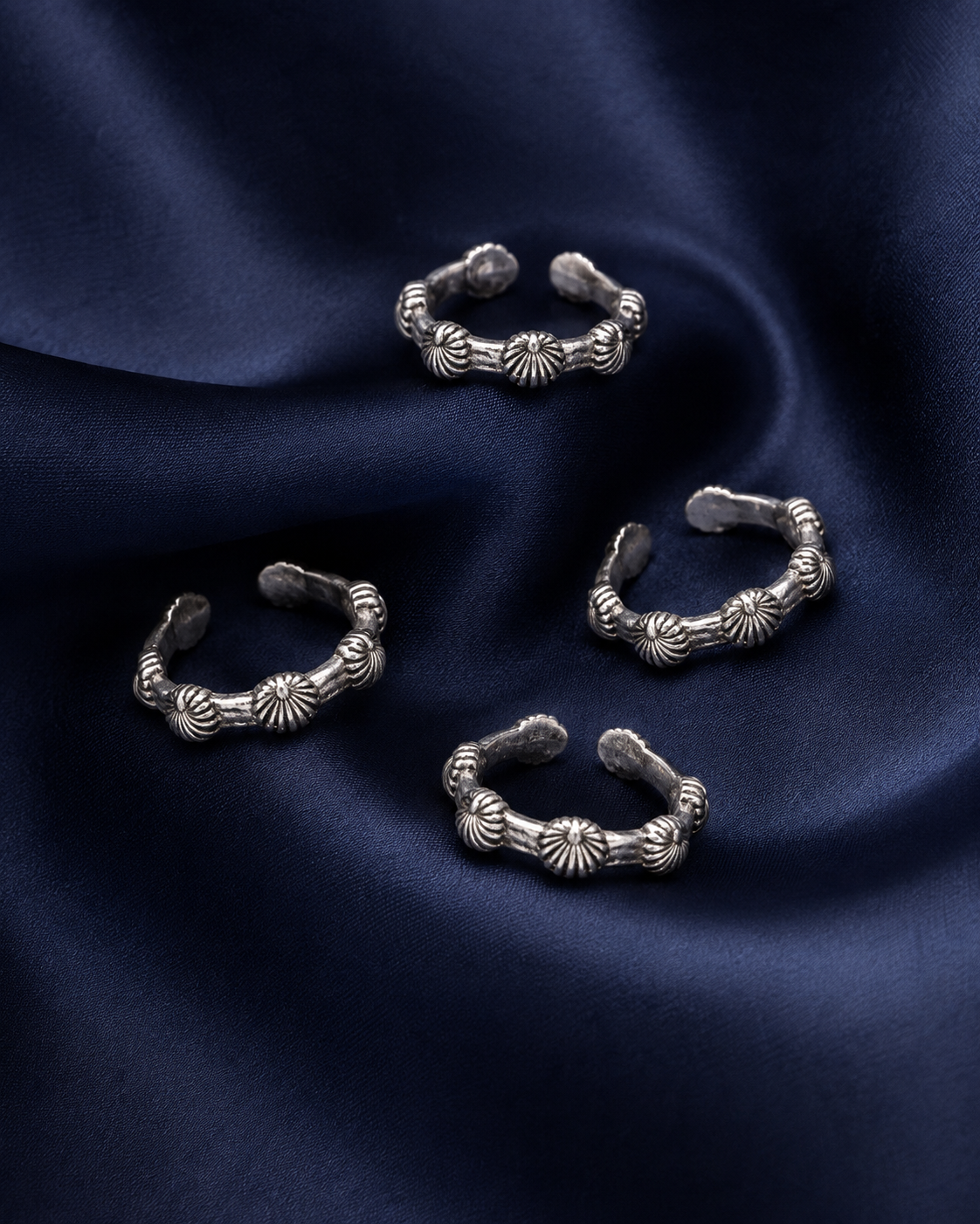 925 Sterling Silver Women's Floral Bead Oxidised Band Toe Rings - Set of 4 - Navy Blue Background