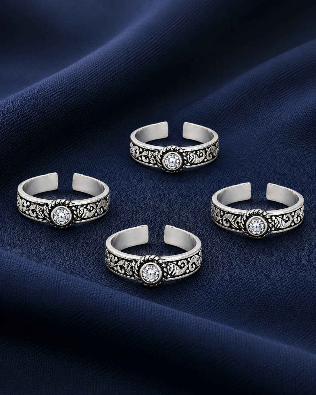 925 Sterling Silver Women's Oval Halo Oxidised Band Toe Rings - Set of 4 - Navy Blue Background