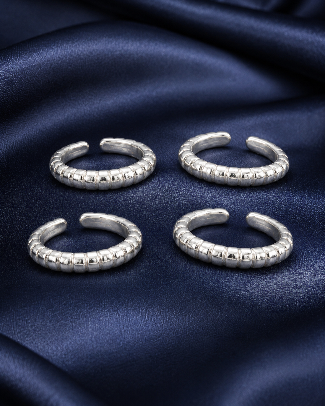 925 Sterling Silver Women's Crystal Row Band Toe Rings - Set of 4 - Navy Blue Background